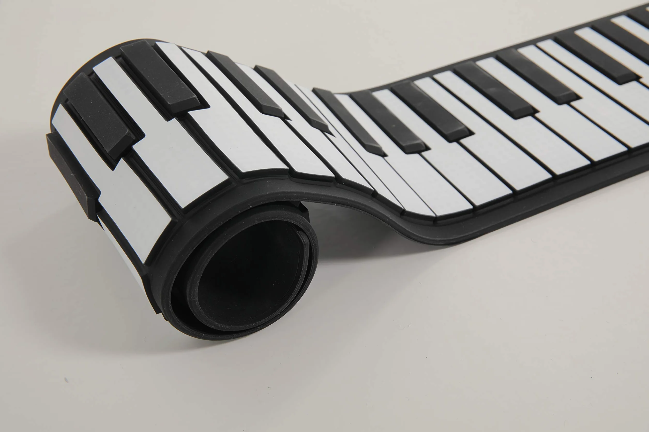 Piano electrónico con 49 teclas, color negro